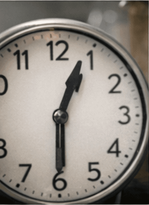 A clock representing the 90–120 minute wait time for edibles