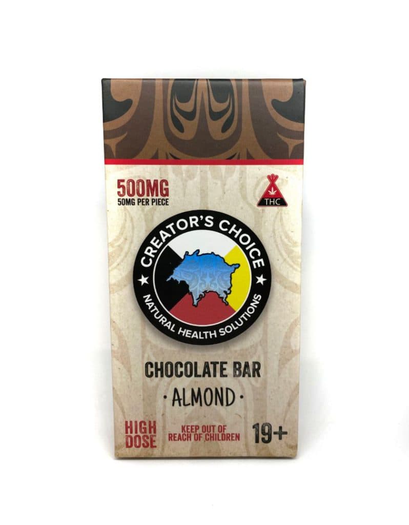 Almond chocolate bar infused with 500mg THC unwrapped showing rich dark chocolate with almond pieces