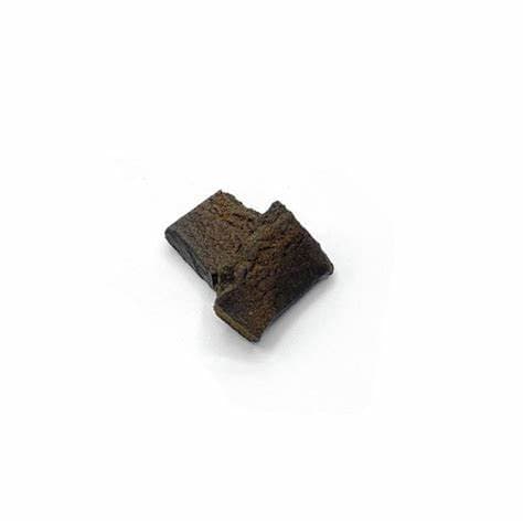 Professor Hash cannabis concentrate in pressed block form, rich amber-brown hash, 60g package by Company 35