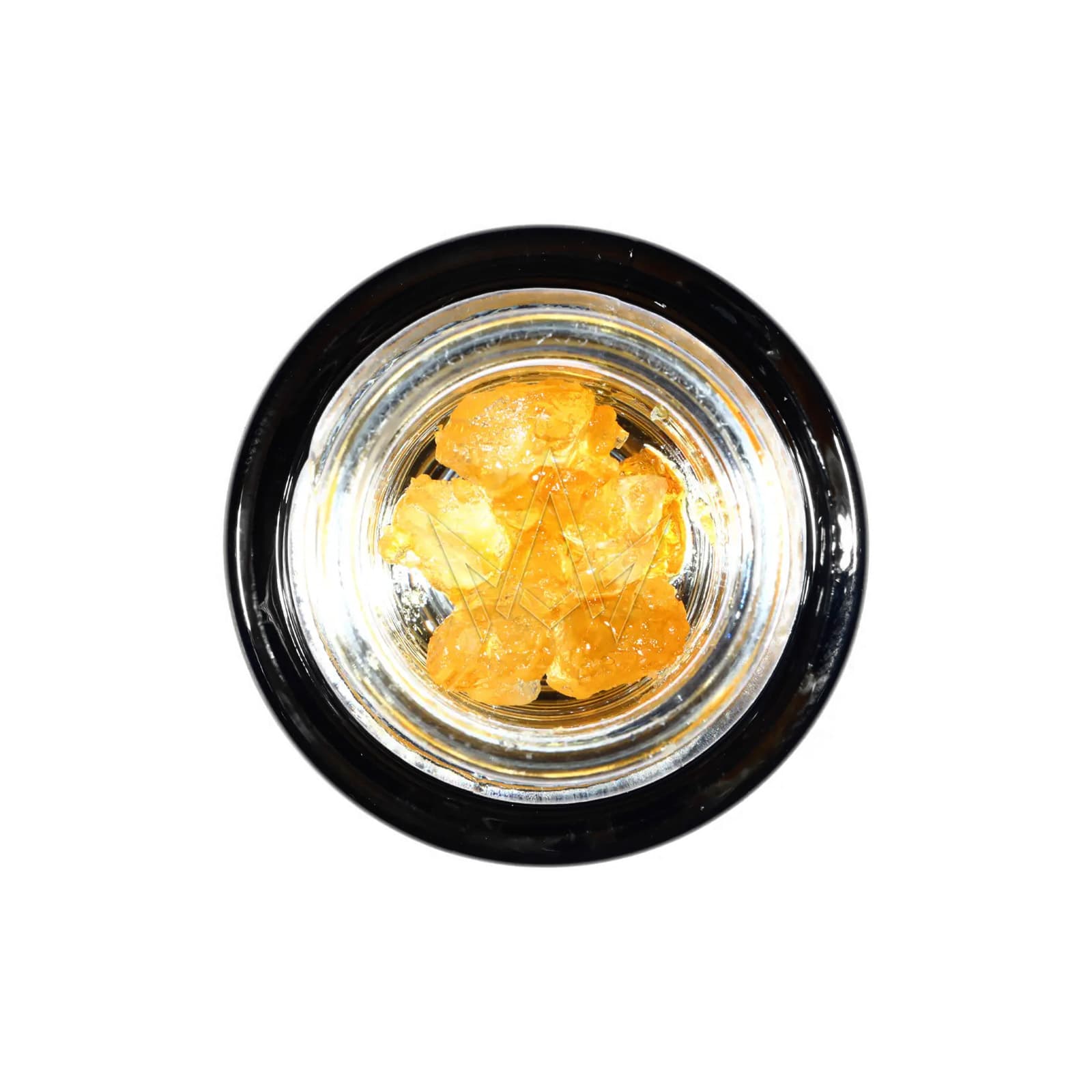 Sparkling crystalline cannabis concentrate diamonds in a small glass jar with high-purity THCA crystal formations