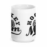 White ceramic 15oz hockey mom mug side view with decorative text or graphic design