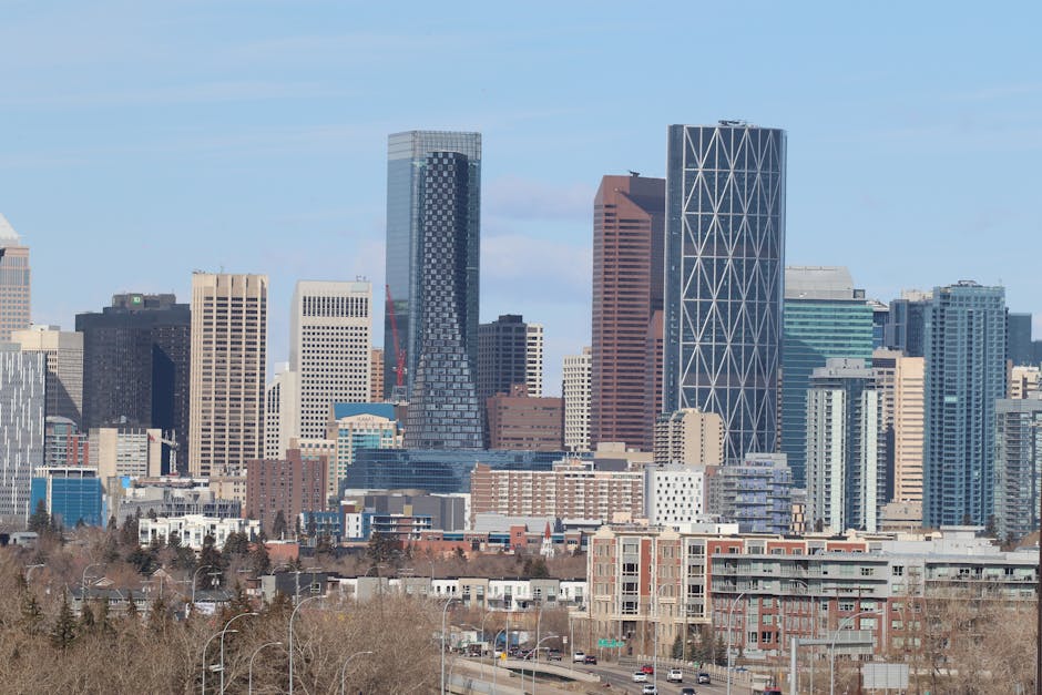 Stunning view of Calgary's modern skyline featuring skyscrapers against a clear sky.