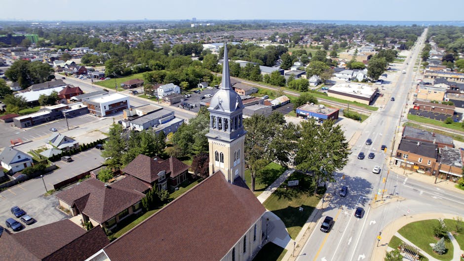 Elevated view of a historic church amidst urban landscape in Windsor, Ontario, Canada.